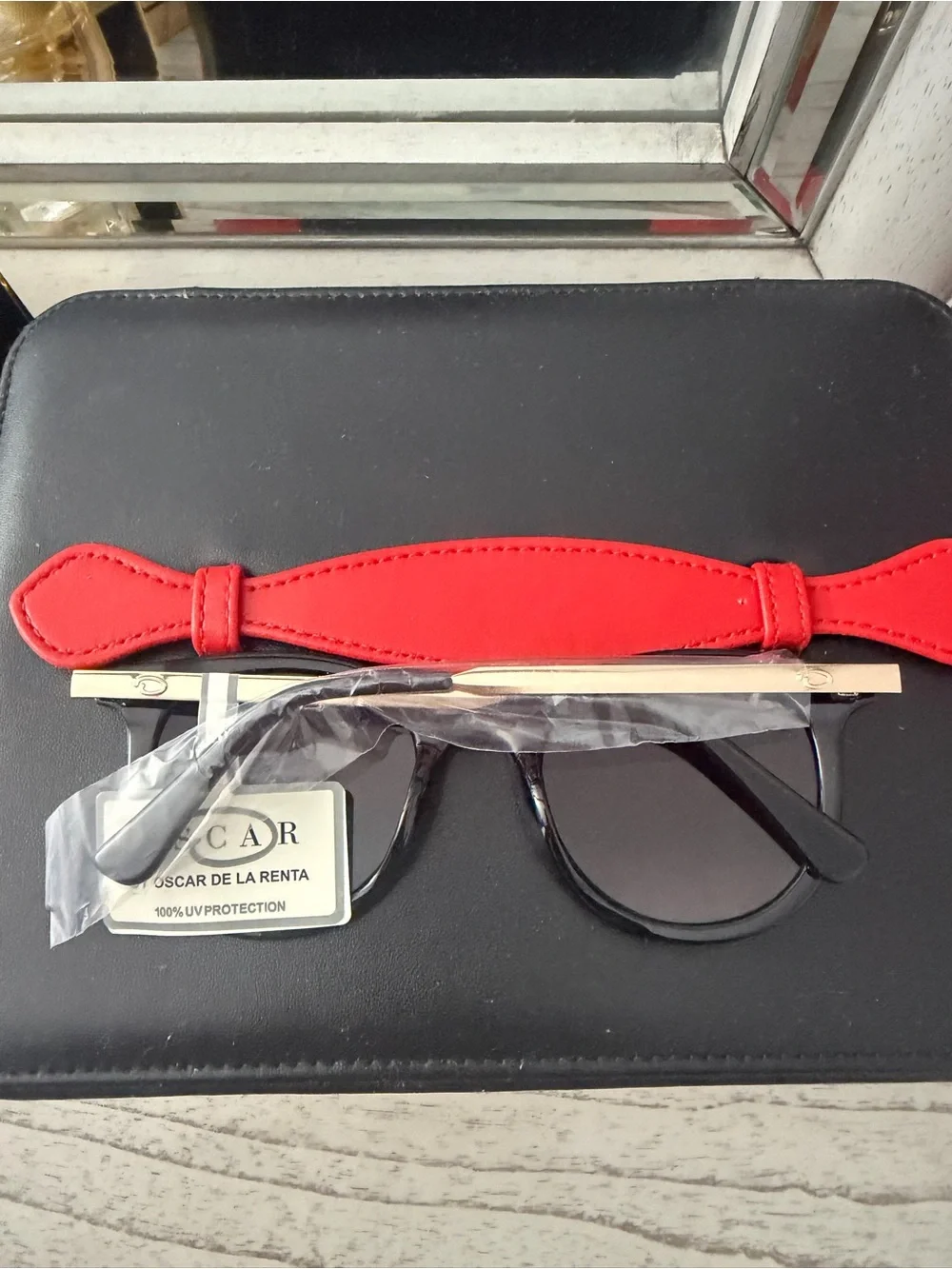 Oscar de la Renta Black Sunglasses with Gold Accent and Red Case Interior